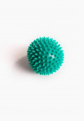 Green foot roller with textured nubs and steel balls
